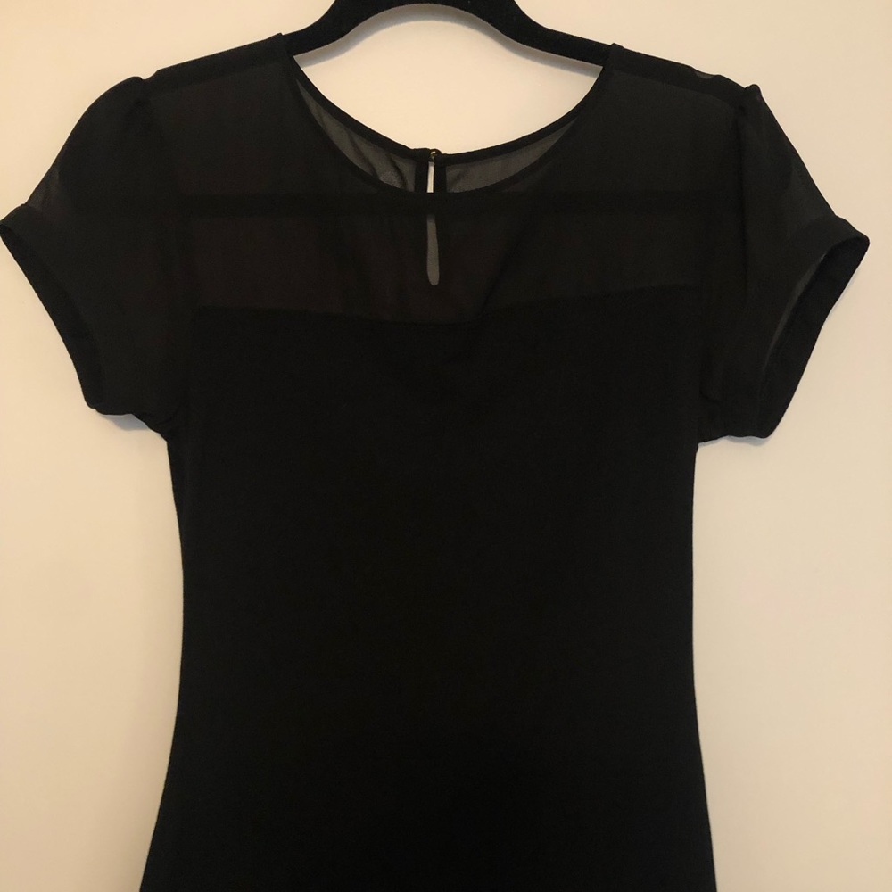Women’s black Express short sleeved top. Size small.